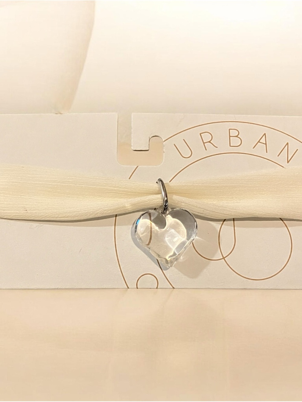 Urban Outfitters Clear Heart Pendant on Cream Ribbon